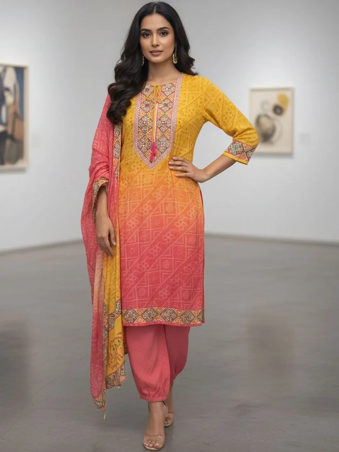 Women's Orange and yellow Musline  Floral Printed Kurti and Trouser with Printed Dupatta