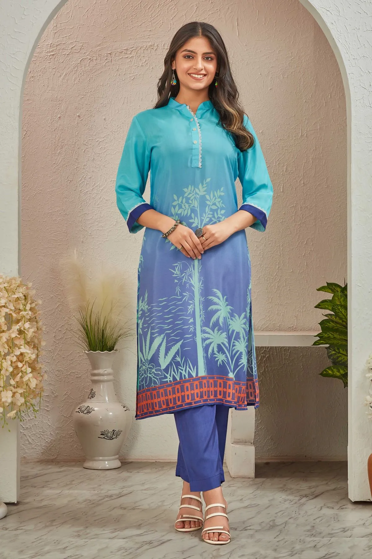 Women's Sky Blue And Navy Blue  Musline Printed Kurti withTrouser