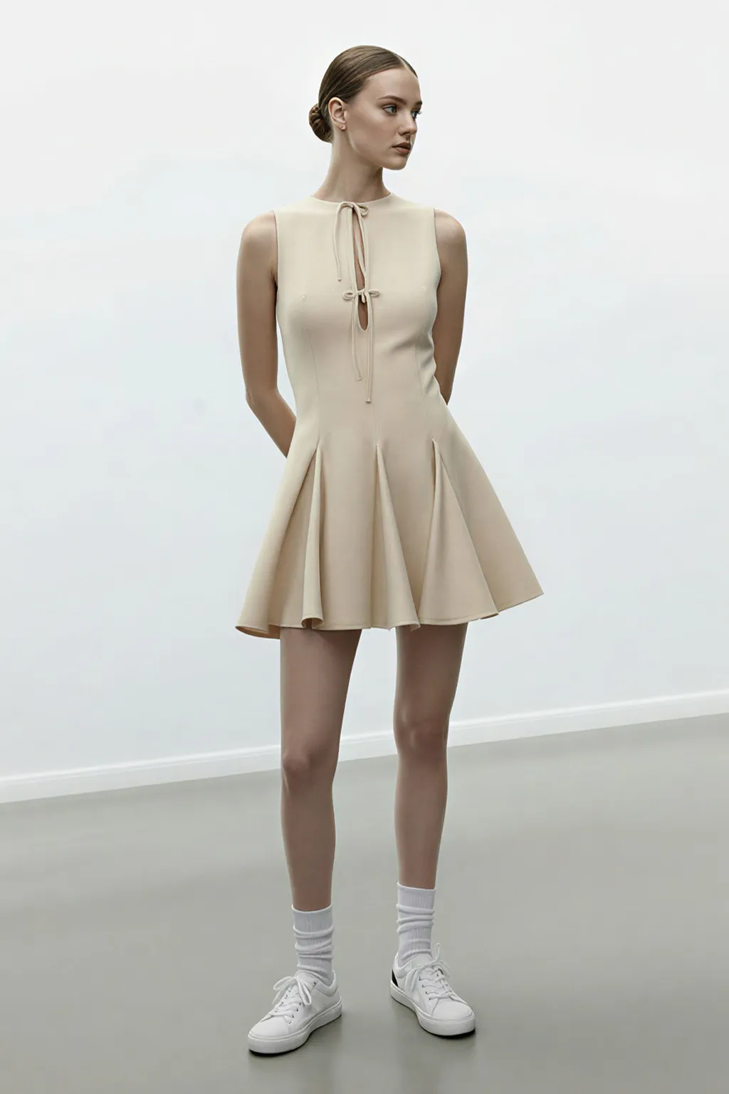 Sleeveless Fit and Flare Mini Dress with Tie-Neck Detail