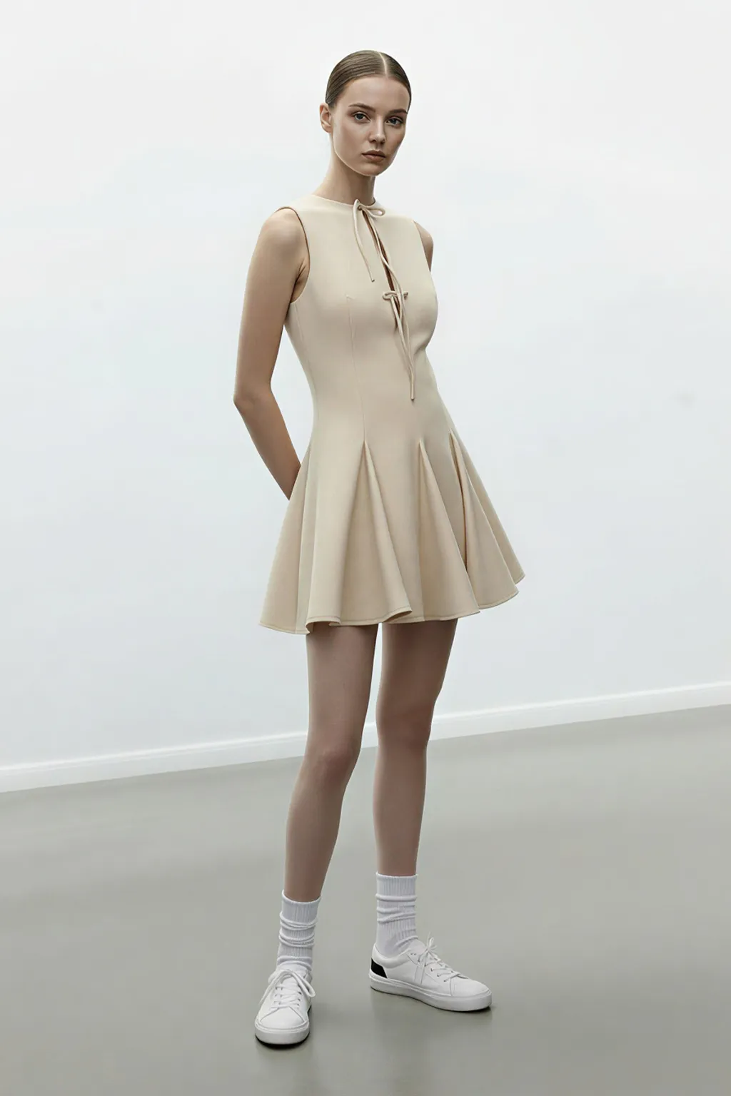 Sleeveless Fit and Flare Mini Dress with Tie-Neck Detail