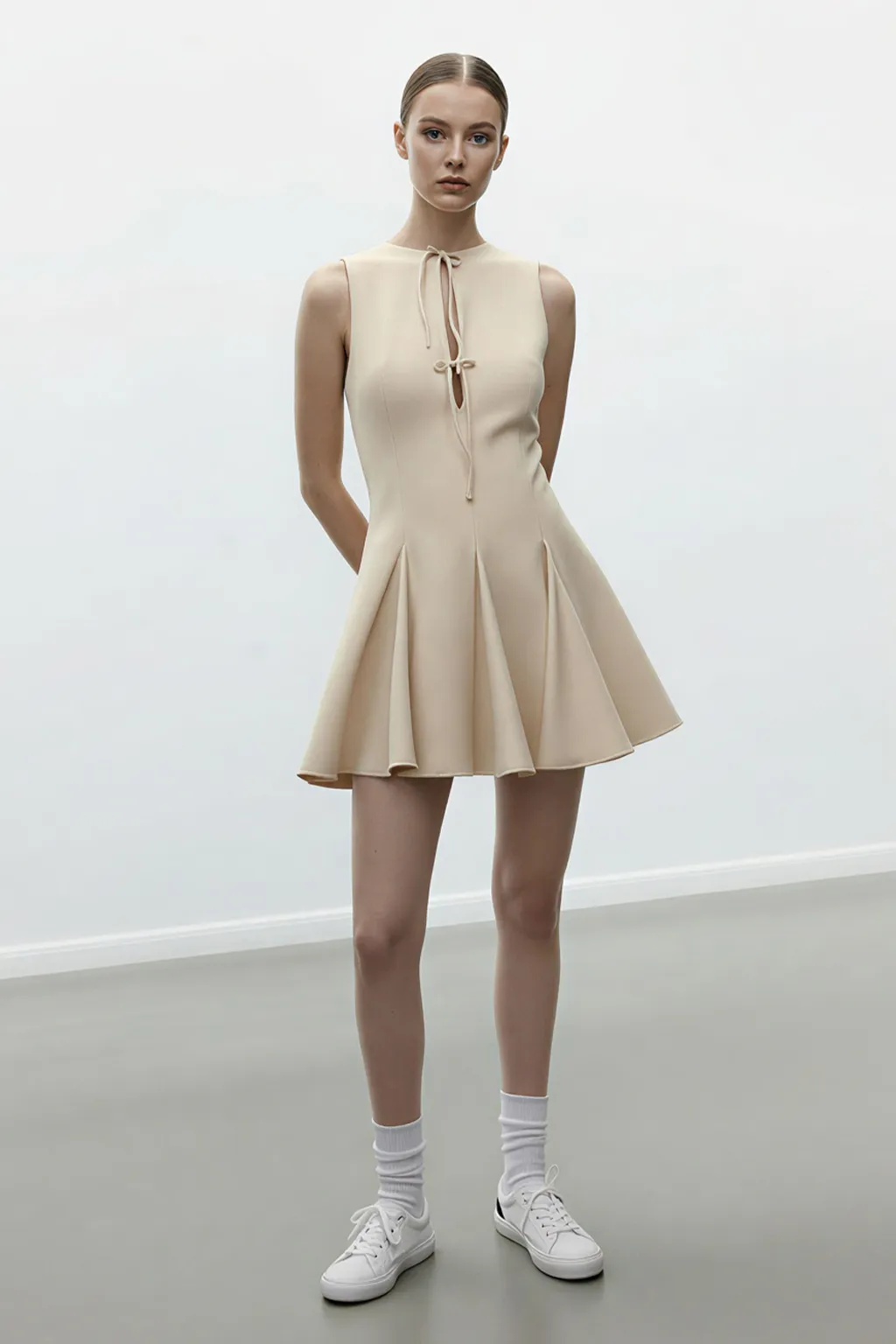 Sleeveless Fit and Flare Mini Dress with Tie-Neck Detail